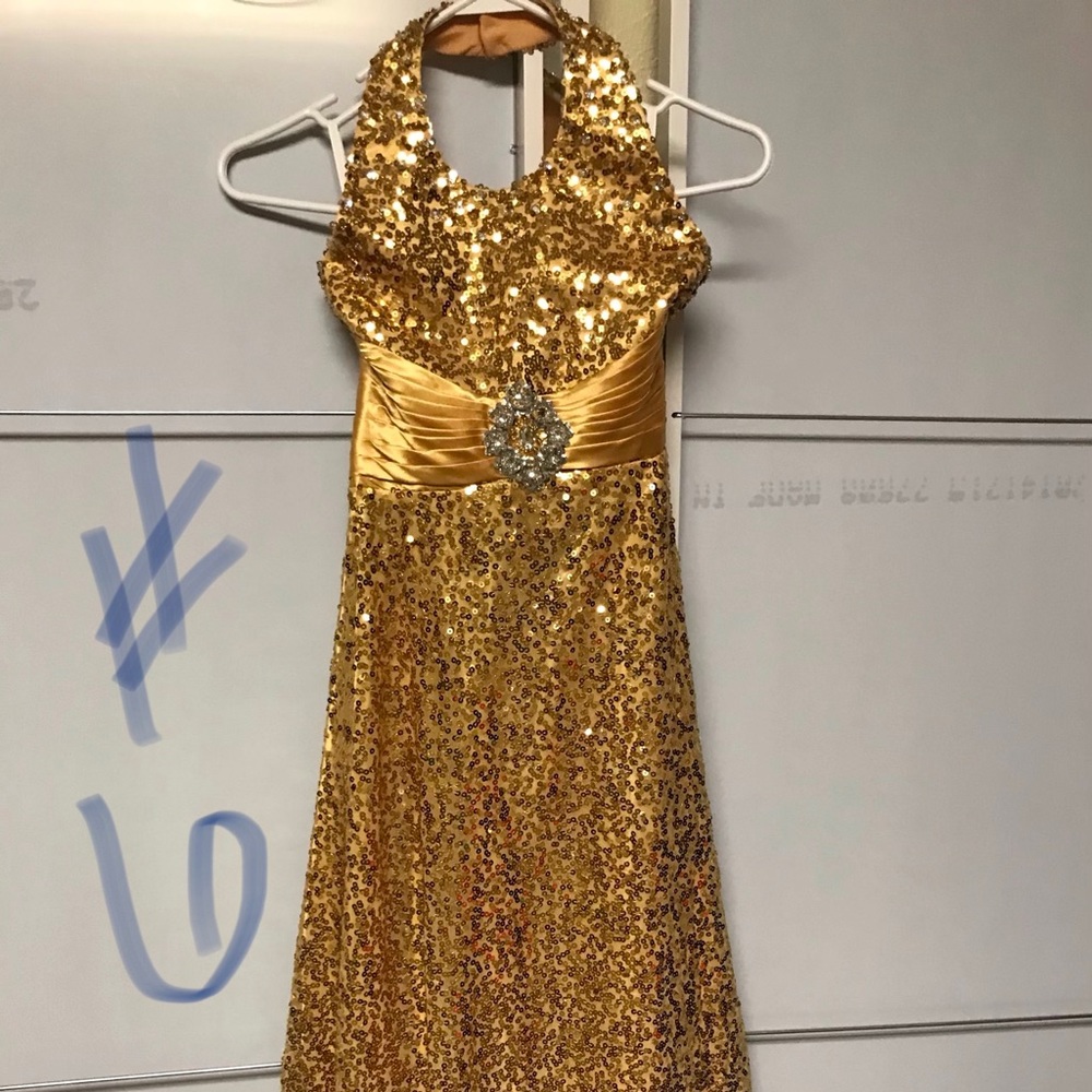 Gold pageant dress.